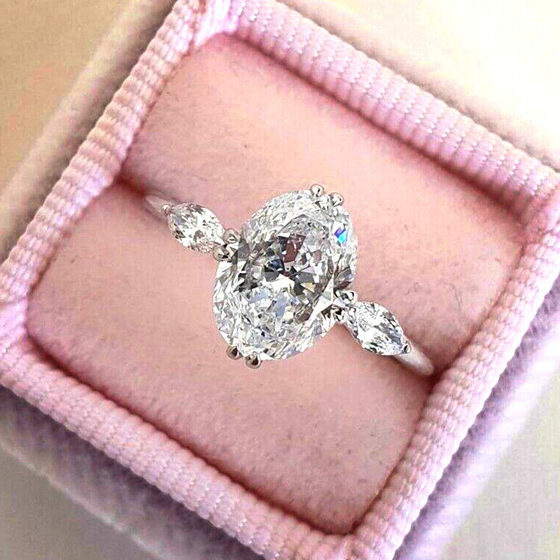 Nuovo anello di fidanzamento da donna con zircone ovale da 10 * 14 mm di Cao Shi, in maglia rossa._voghion.com