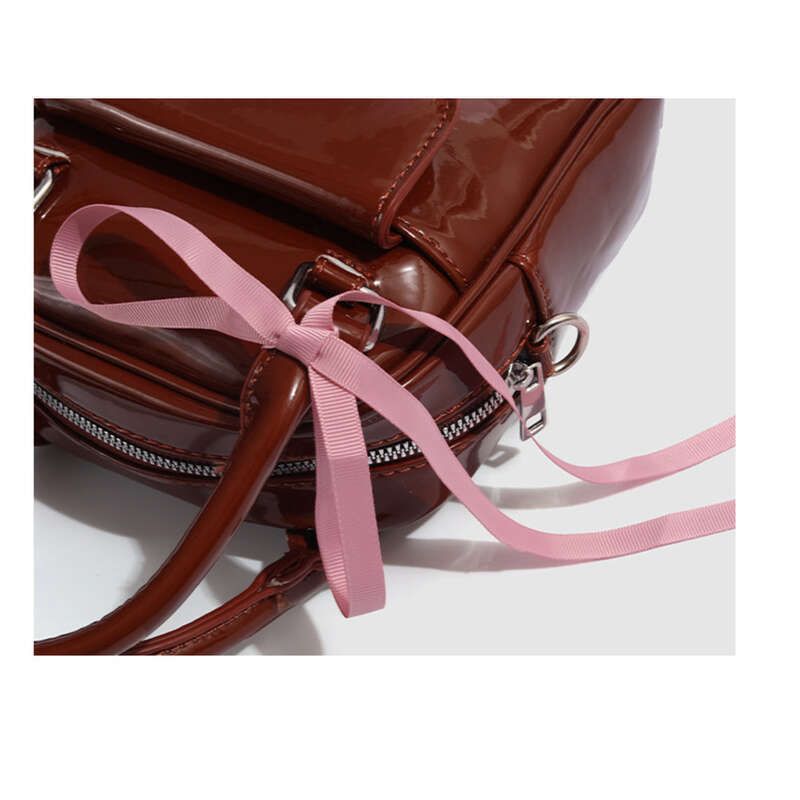 Elegante mini zaino con fiocco in pelle verniciata color cioccolato, borsa a tracolla alla moda e versatile_voghion.com