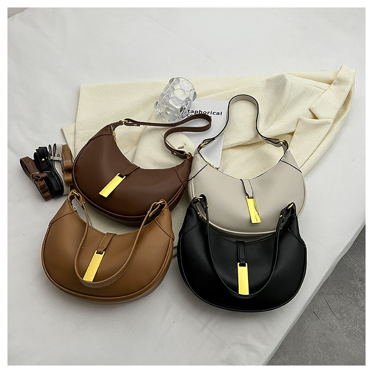 Borsa ascellare dal design di nicchia francese per la nuova borsa a mezzaluna minimalista primavera 2023 da donna Borsa a tracolla questa sensazione_voghion.com