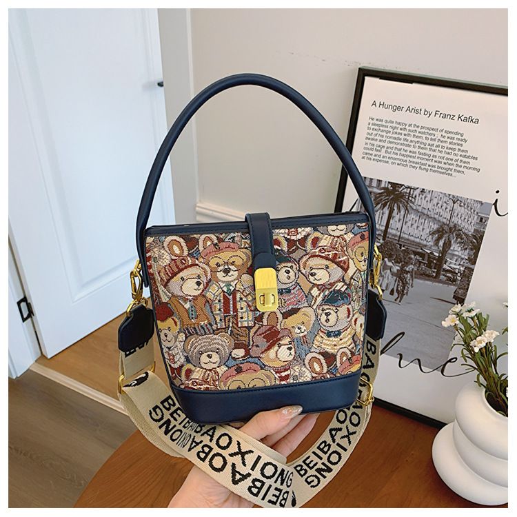 Borsa a secchiello di grande capacità, borsa a mano con design di nicchia, borsa da donna versatile, borsa a tracolla singola_voghion.com