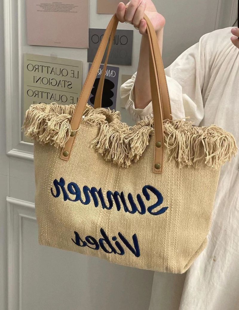 Neue Strand-Reisehandtasche, modisch, einfache Quaste, große Kapazität, Umhängetasche für Mama, neue Flut_voghion.com