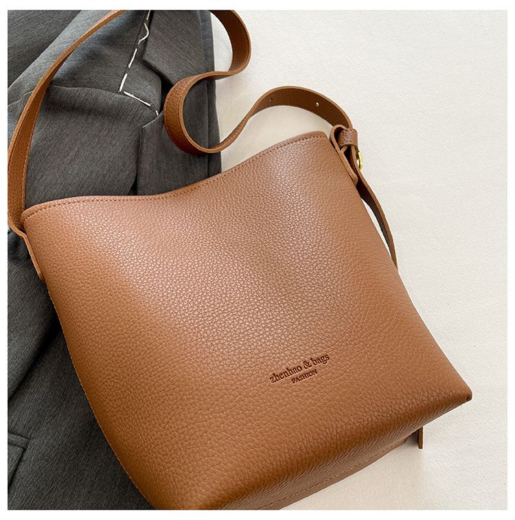 La borsa a tracolla con design a croce diagonale di fascia alta di quest'anno, modello Bucket 2024, è il nuovo stile di moda per mamma e bambino_voghion.com