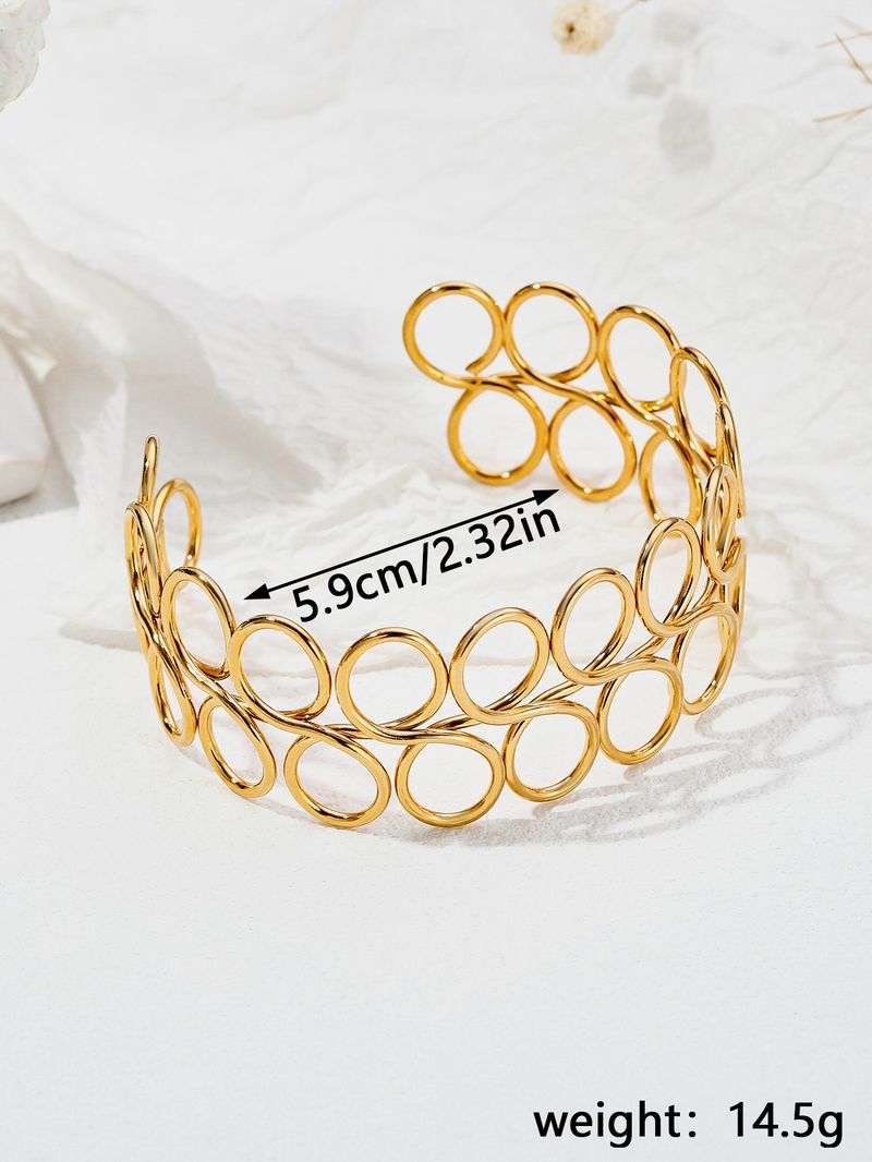 Bracelet en acier inoxydable creux simple en métal avec décoration à la main personnalisée en titane_voghion.com