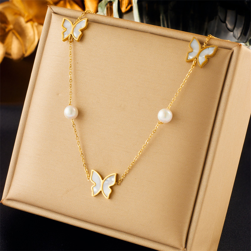 Mode Nische kreative Persönlichkeit Perle Schmetterling Liebe Augen Zubehör Anhänger Schmuck Kette vielseitig Halskette_voghion.com