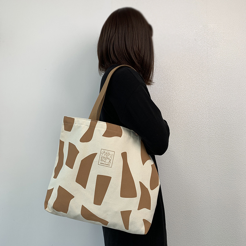 Tela da donna monospalla per lezione, outfit da studentessa universitaria, stile coreano Instagram con cerniera, design artistico,_voghion.com