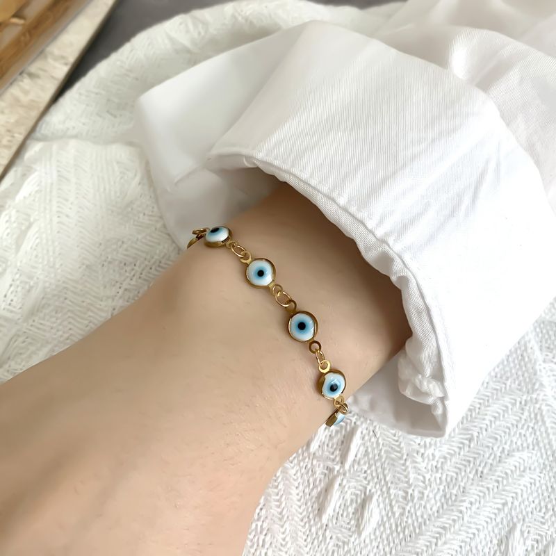 Braccialetto bohémien turco contro il malocchio | Design vintage regolabile | Amuleto colorato rivestito in resina epossidica | Lega ipoallergenica | Regalo di gioielli bohémien protettivi_voghion.com