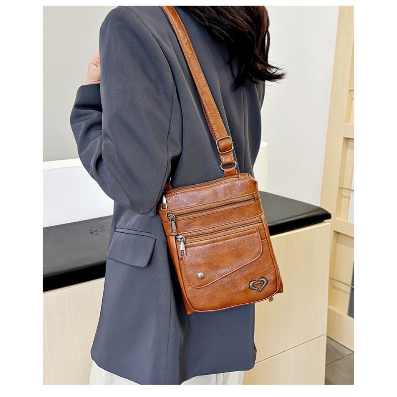 Nova bolsa para celular com tela grande 2025, mochila pequena feminina de couro macio, bolsa de ombro e transversal, bolsa para troca de viagem e lazer ao ar livre_voghion.com
