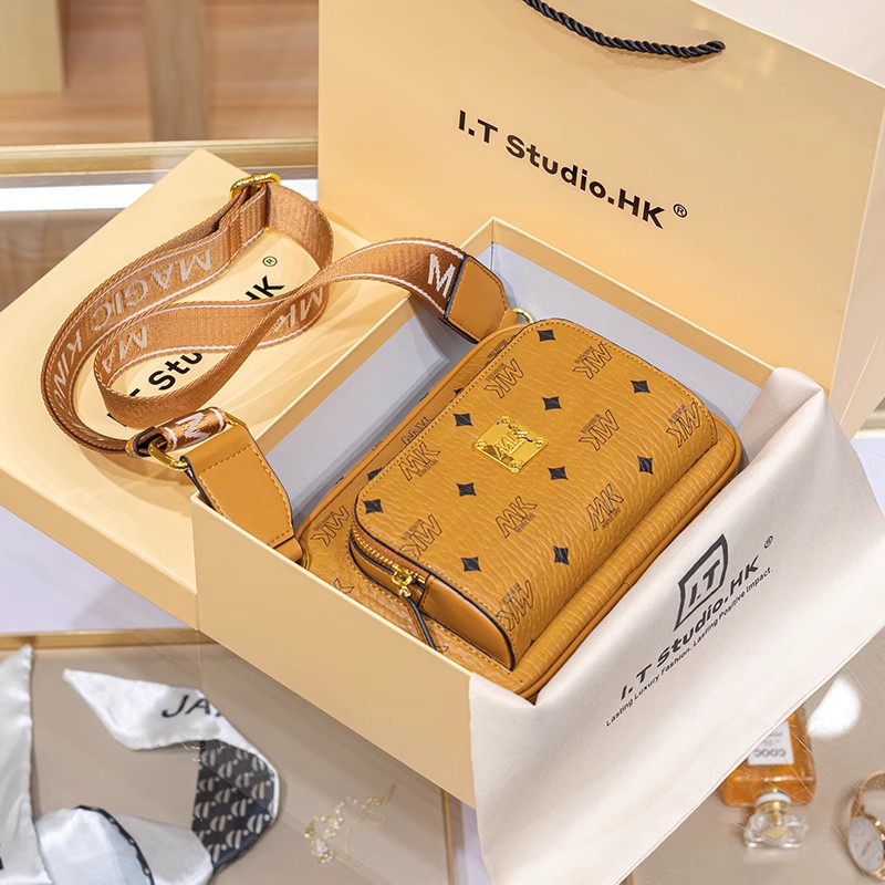 Hong Kong counter genuine leather camera for women's new 2023 high-end texture niche summer wide shoulder strap_voghion.com