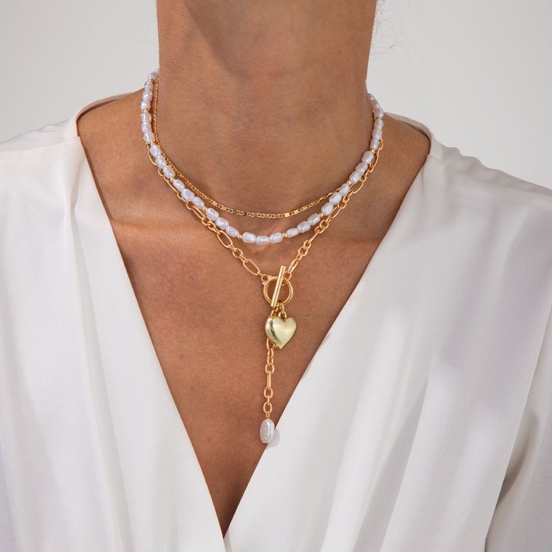 Collana da donna Collana dorata Collana con ciondolo Collana in oro Elegante cuore croce pendente Collana con perle barocche a strati Collana con clavicola_voghion.com