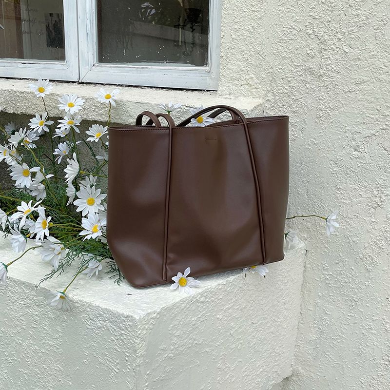 Tote Women's One Shoulder Large Capacity Student Commuter Mommy Soft Leather Book Bag Instagram Korean Version 2024 New_voghion.com
