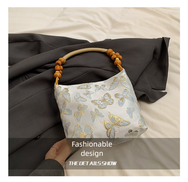 Borsa a mano in stile cinese, versatile, di alta gamma, estiva, da donna, con texture in bambù, 2025_voghion.com