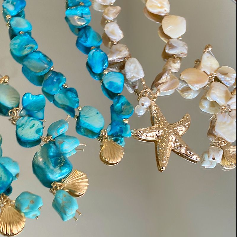 Schelp, zeester, schelp, parelketting, zomerse strandvakantiestijl, sleutelbeenketting, modieus en veelzijdig_voghion.com