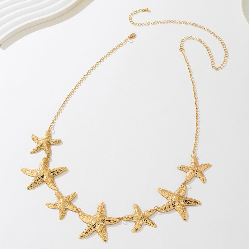1 elegante e alla moda ciondolo a forma di stella marina in metallo della serie Ocean per donna_voghion.com