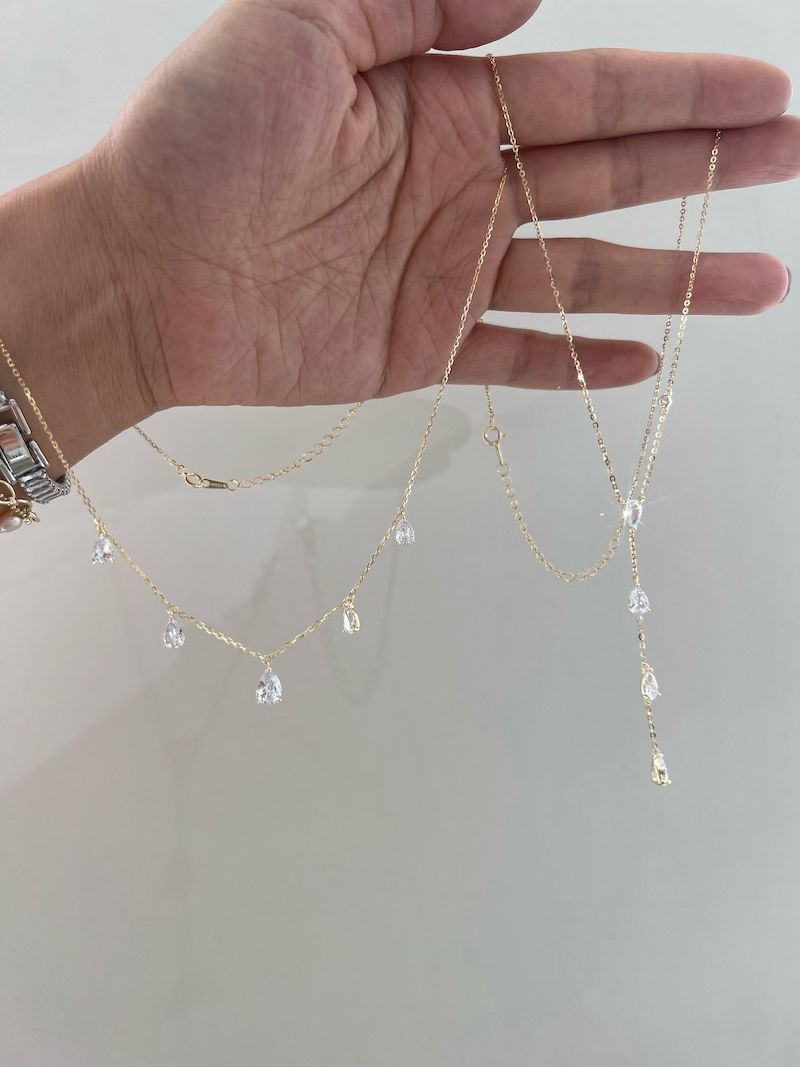 2024 Halsband med glänsande zirkondroppöverlägg och dubbelt lager guldfärgad kedja för festdamer, utsökta smycken_voghion.com