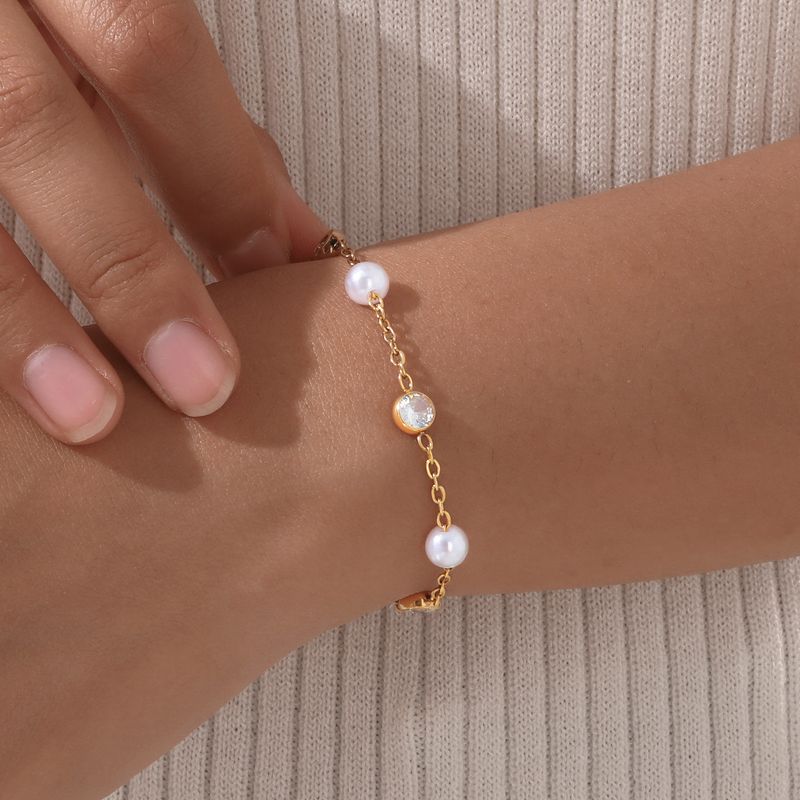 Bracciale da donna in acciaio inossidabile con catena a croce piatta e zirconi, perle, stile vintage dorato, per autunno e inverno_voghion.com