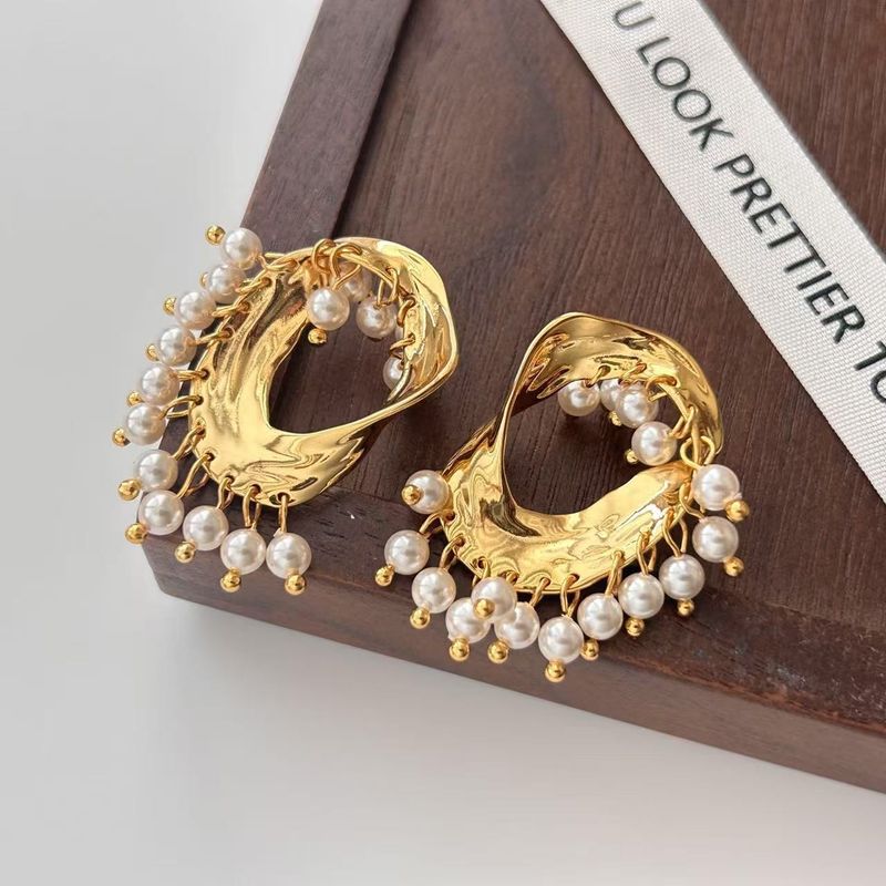 Wind Hollow Tassel Golden Branch Jade Leaf Ear Clips Elegant Exaggerated Goddess High-end Earrings_voghion.com