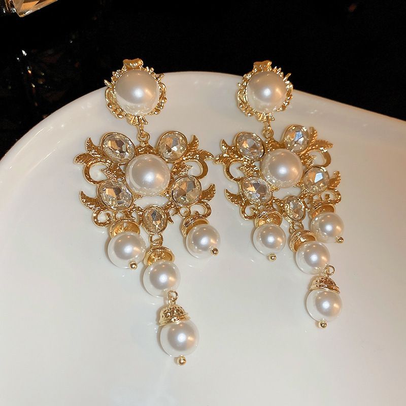 Orecchini con perle e diamanti in argento con frange a forma di fiore, orecchini di nicchia, temperamento atmosferico, orecchini di lusso leggeri e di alta gamma._voghion.com