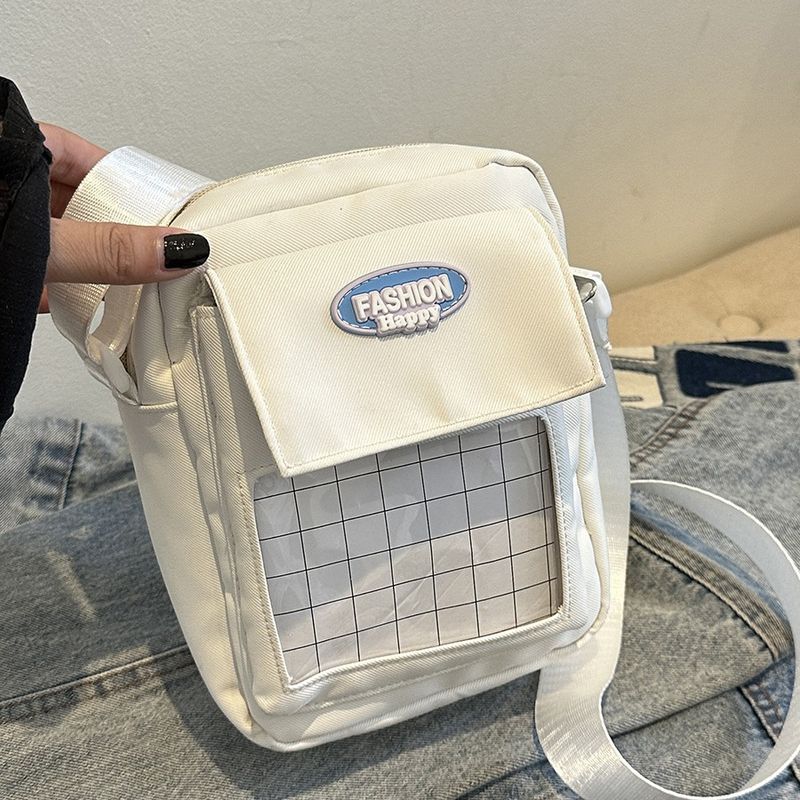Borsa a tracolla piccola e versatile, con tracolla singola, trasparente, con distintivo, motivo a grana grossa, per telefono cellulare._voghion.com