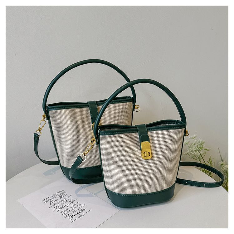 2024 nieuwe tas dames trendy en modieuze draagbare emmertas met klein ontwerp contrasterende kleur splitsen enkele schouder crossbody tas_voghion.com