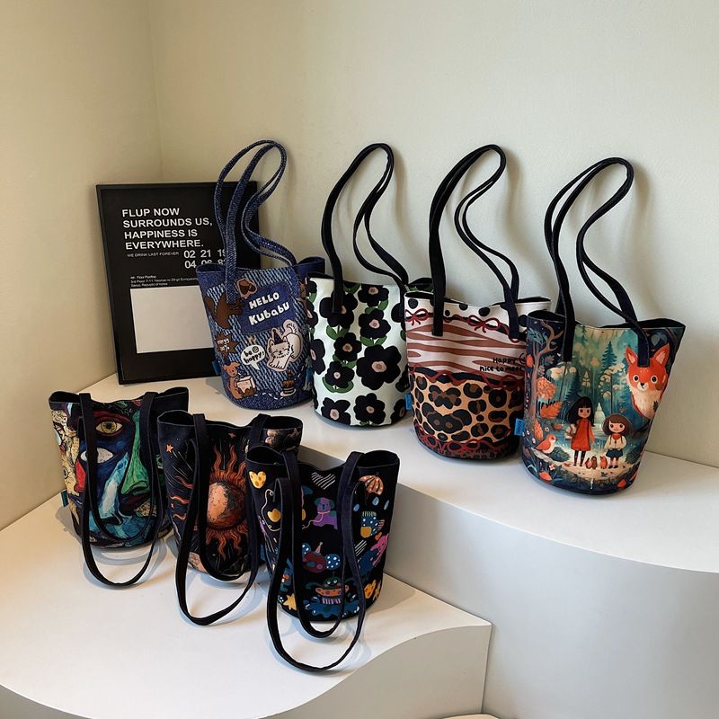 Borsa a secchiello patchwork con stampa leopardata, 2025, nuova borsa a mano di grande capacità, design di nicchia, borsa a tracolla alla moda per donna_voghion.com