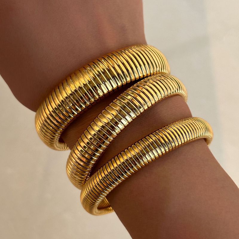 Bracciale Gypsy elastico in acciaio al titanio placcato oro vero_voghion.com