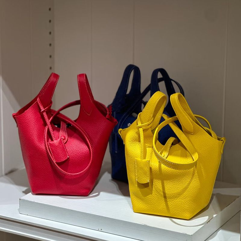 2025 New Litchi Texture Dopamine Colorful Basket Commuter Versatile Bucket Handheld Crossbody Bag For Women_voghion.com