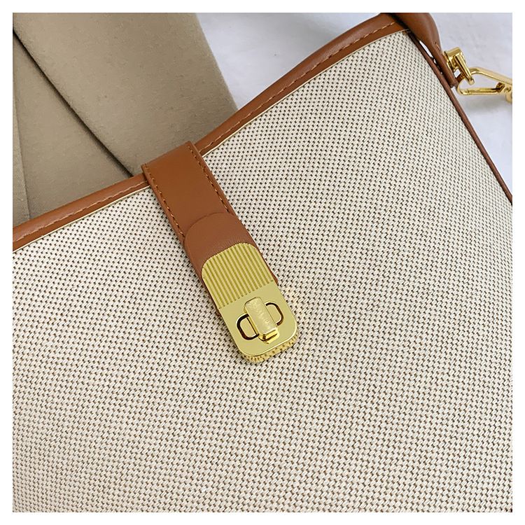 2024 nieuwe tas dames trendy en modieuze draagbare emmertas met klein ontwerp contrasterende kleur splitsen enkele schouder crossbody tas_voghion.com