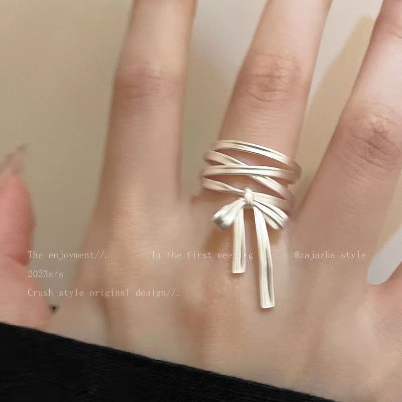 Kall distanserad fransk rosett och bandöppning, kvinnlig nischdesign med avancerad justerbar pekfingerring, unik_voghion.com