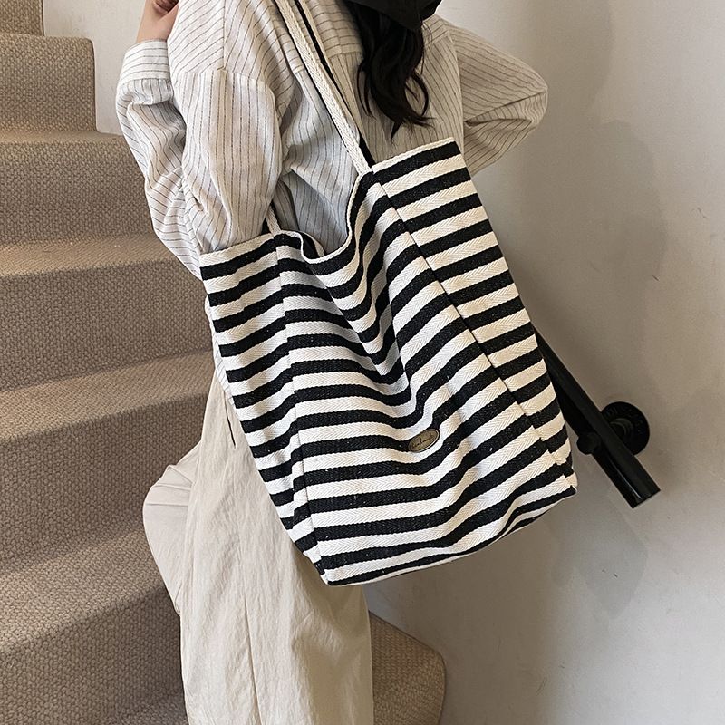 Borse a tracolla da donna: una borsa tote casual a righe con blocchi di colore, dallo stile dolce e rilassato, borsa a tracolla singola bifacciale_voghion.com