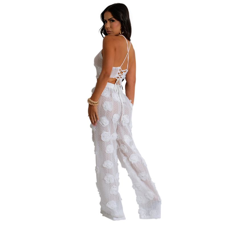 Completo due pezzi in tinta unita con top corto e pantaloni larghi e aderenti da donna_voghion.com