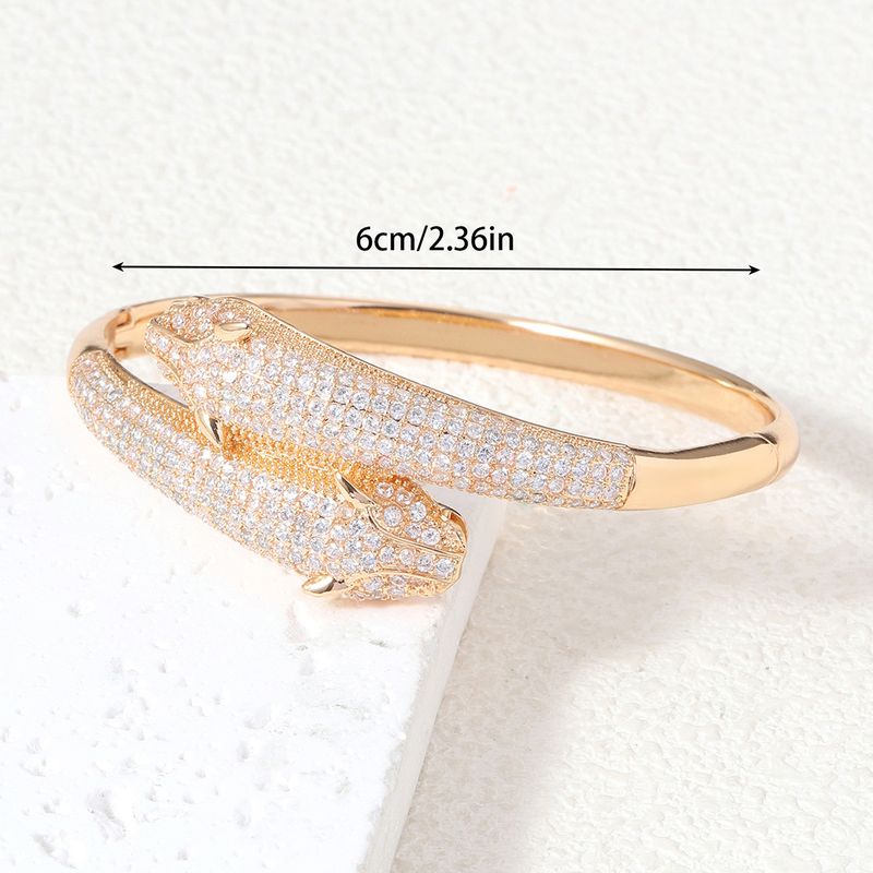 Hohe Version Schwere Handwerk Zirkon Intarsien Doppel-Headed Leopard Armband Licht Luxus High-End-Design Offene Armreif Heißer verkauf_voghion.com