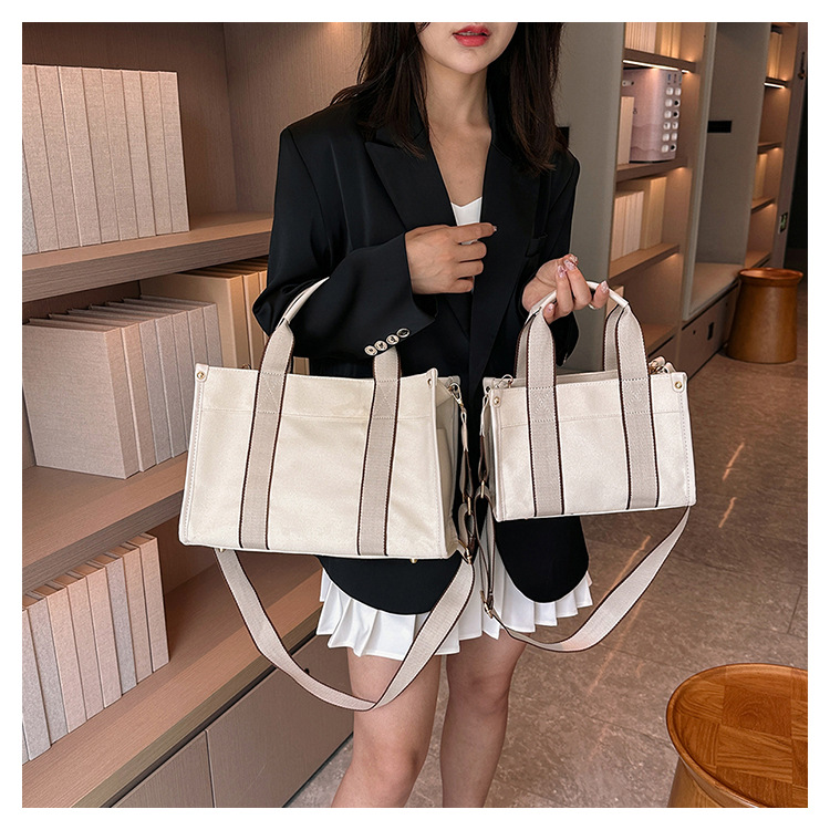 Japan and South Korea Foreign Trade Canvas Bag Women 2023 New Trendy Fashion handbag niche hit color commuting shoulder Messenger bag_voghion.com