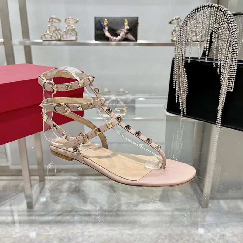 High Version 2025 Rivet Flat New Summer One Button Fashion Vielseitige Liuding Pinch Toe Roman Schuhe Damen Cool_voghion.com