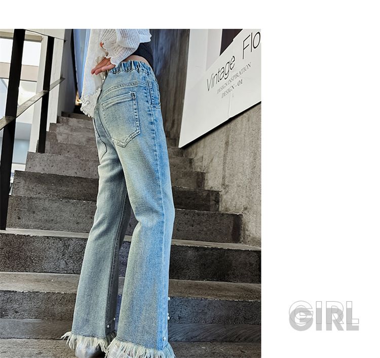 Ropa para niños Niñas 2024 primavera y otoño nuevos modelos para niñas medianas y grandes elegantes pantalones acampanados de mezclilla con borde sin rematar con borlas de perlas_voghion.com