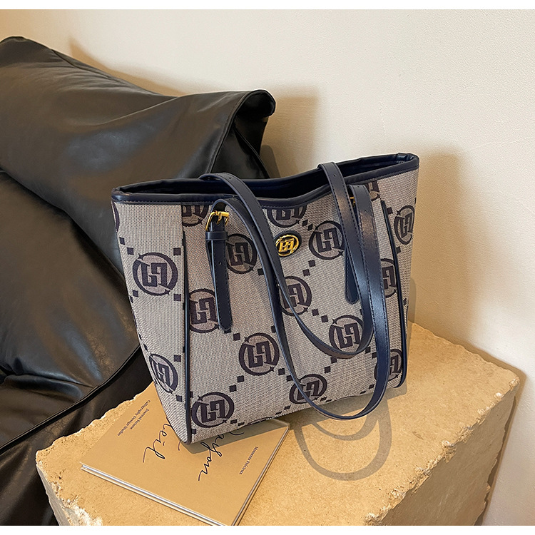 2023 Neue, heiß verkaufte Jacquard-Premium-Einkaufstasche für Damen mit großer Kapazität, ausgehende Handtasche, vielseitige, temperamentvolle Umhängetasche für Damen_voghion.com