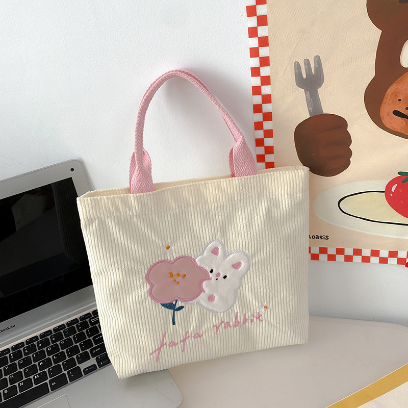 Simpatica tela in velluto a coste con fiori di coniglio con grande capacità per uscire a fare shopping, portatile per lavoro, piccola borsa_voghion.com