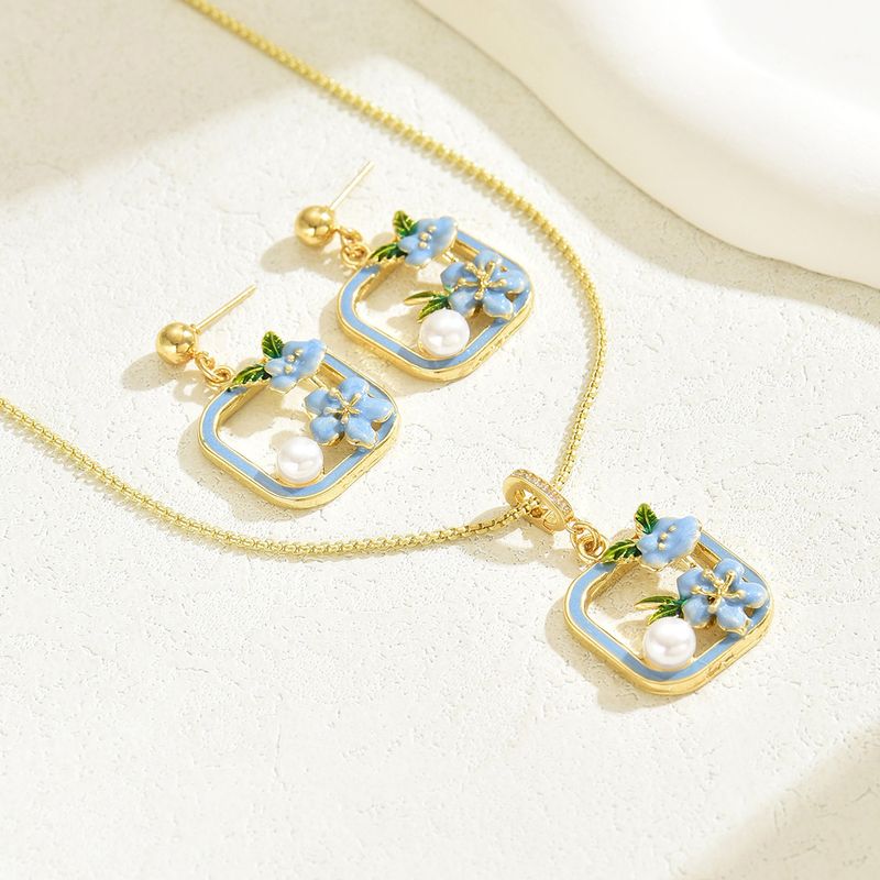 Set di collana e orecchini a forma di fiore per donna - Gioiello alla moda con intarsi a goccia d'olio e pendente dal design elegante_voghion.com