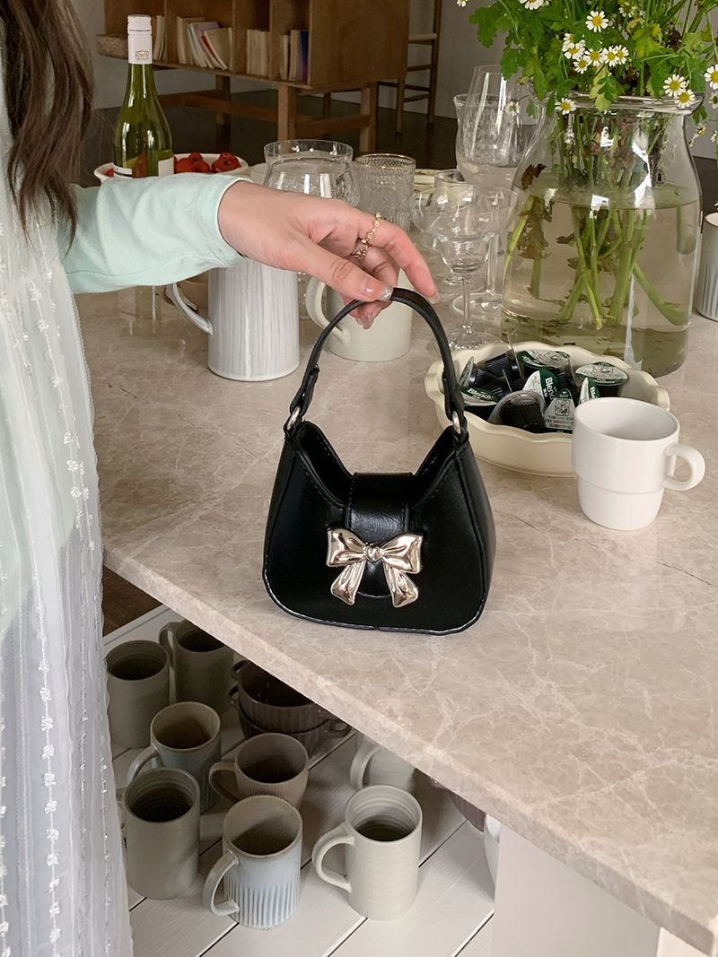 Niche bow handbag new spring/summer trend sweet cool lipstick chain crossbody mini small bag for women_voghion.com