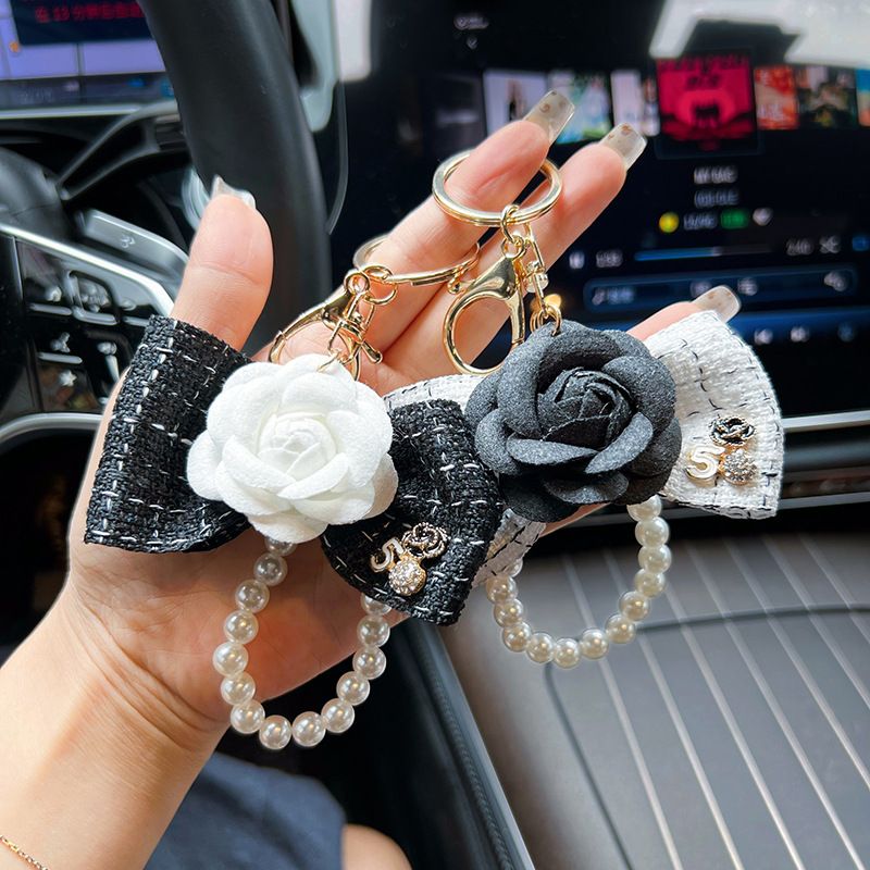 Personalized pearl chain, small fragrance bow, camellia creative and exquisite car keychain, bag decoration, female_voghion.com