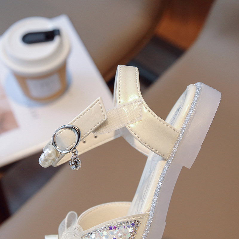 Mädchen Mode Prinzessin 2024 Sommer Neue Mädchen Baby Bogen Headed Kinder Hohl Sandalen_voghion.com