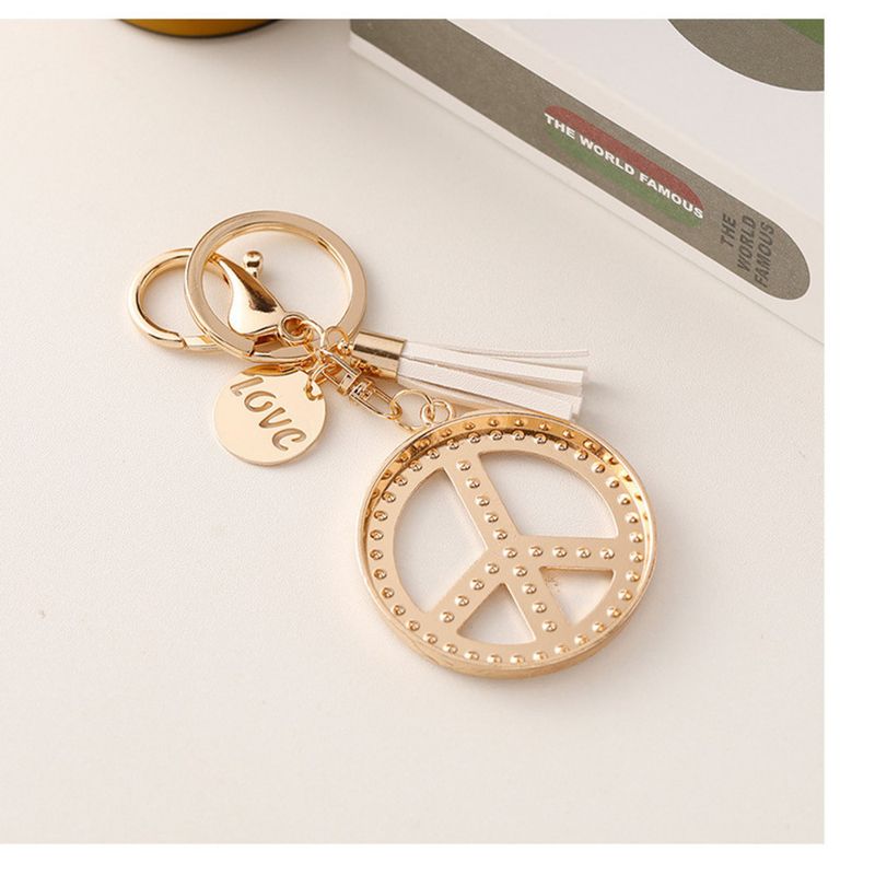 Portachiavi con nappa con logo creativo della pace in versione coreana, borsa in metallo con diamanti intarsiati, ciondolo, accessori per auto, macchina per artigli,_voghion.com
