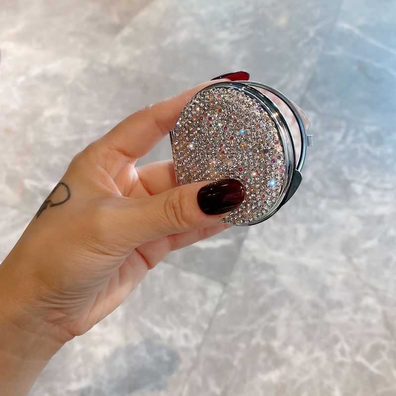 Elegante ronde minispiegel met diamanten – compacte dubbelzijdige make-upspiegel met klapdeksel voor thuis en op reis (6 cm, PU/PS/PVC-frame)_voghion.com