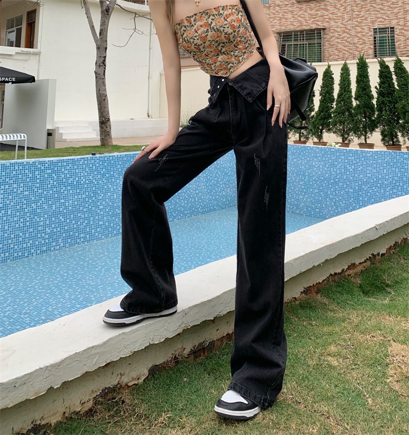 Pantaloni a gamba larga in denim a vita alta americani per donna, caratterizzati da un design piccolo che accentua una vestibilità aderente._voghion.com