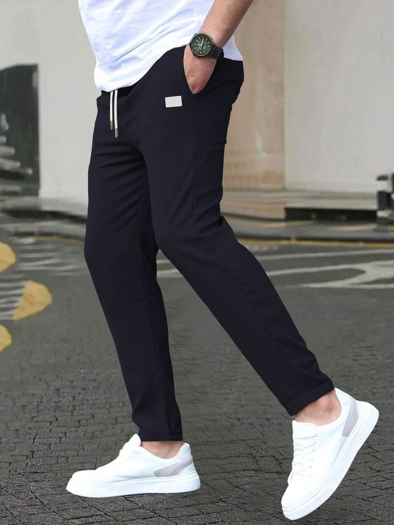 Pantaloni casual slim fit da uomo - Tinta unita, design a nove punti, dettaglio etichetta in pelle, comodi pantaloni con tasche_voghion.com