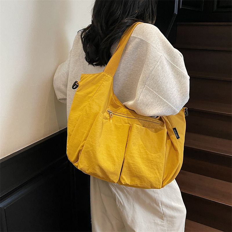 Borsa a tracolla grande e capiente in tela da donna, modello Dumpling, modello 2025, semplice e alla moda, in vendita a poco prezzo_voghion.com