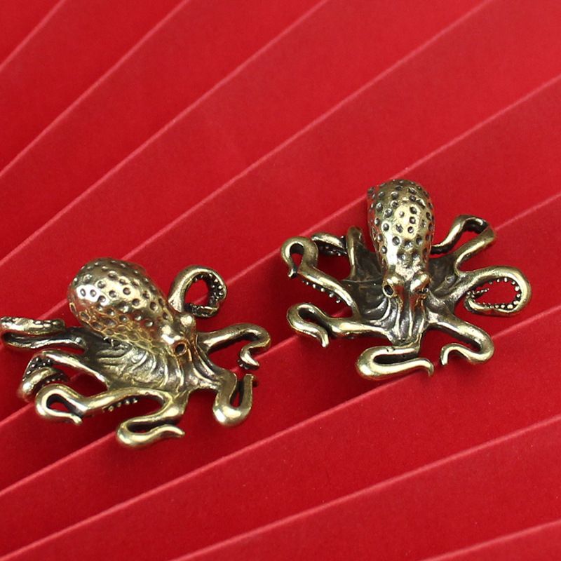 La boutique créative pour animaux de compagnie de thé en forme de poulpe en laiton massif fait à la main peut élever huit mètres carrés pour gagner de l'argent_voghion.com