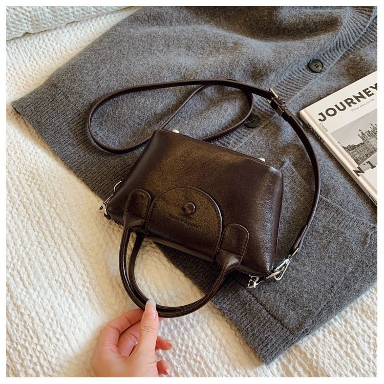 Hih end pleated texture handba for women 2024 niche desin draon bas Xian commutin crossbody versatile shoulder_voghion.com