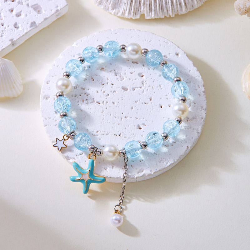 Pulsera de hadas de moda con cuentas de explosión de concha de goteo de aceite, campana de perlas y cuerda trenzada._voghion.com