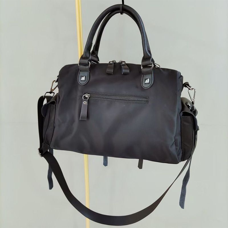 Borsa a tracolla in nylon da donna con borchie in denim, borsa a tracolla alla moda, autunno/inverno 2025, novità_voghion.com