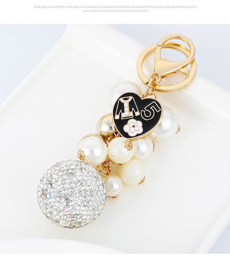 Exquisite diamond studded round pearl string small fragrance keychain clothes 5-character metal decoration bag pendant_voghion.com